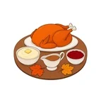 Thanksgiving dinner table with roast turkey, mashed potatoes, gravy and cranberry sauce.