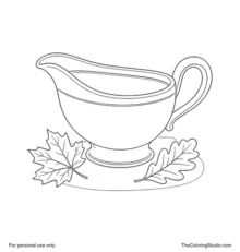 Classic cream gravy boat filled with brown gravy beside two large autumn leaves.
