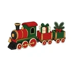 Wooden Christmas toy train with two cars carrying a wrapped gift and evergreen sprig with a small bell.