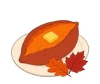 Baked sweet potato split open with a butter pat on a cream plate beside two autumn leaves.