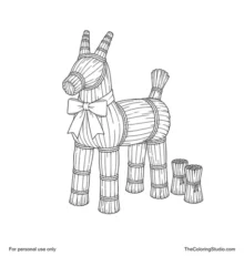 Traditional straw Yule goat with red ribbon and two small bundled straw decorations on a white background.