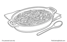 Oval green bean casserole with golden crispy onions, a wooden serving spoon, and folded terracotta napkin.